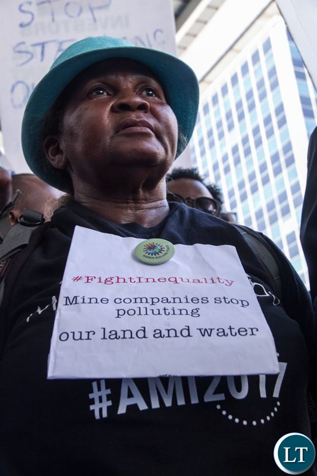 An elderly woman joined in the protest march