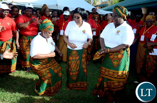 First Lady Esther Lungu and Mozambique First Lady Isaura Nyusi join women in dancing during the closing ceremony of the just ended Conference on ending child marriage and early pregnancies in Pemba City, Mozambique on Sunday,February 26,2017 -Picture by THOMAS NSAMA/STATE