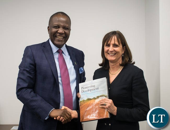 Hon. Felix Mutati with CDC chief executive officer Diana Noble after having a successful meeting.