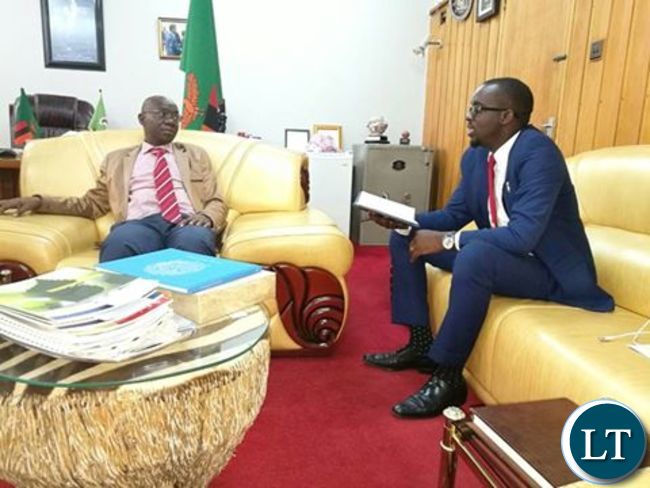 Kitwe Mayor Christopher Kangombe discussing with his Lusaka counterpart Wilson Kalumba at the Mayoral office in Lusaka recently