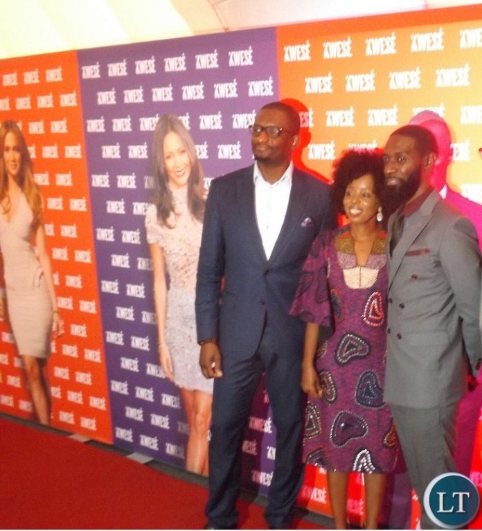 (Left to right)Econet media CEO Joseph Hundah ,General Manager Zambia Kwese TV Kapa Kaumba , General Manager Zambia Kwese Free TV Tivo Shikapwashya