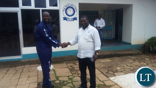 Gerald Chiluba meeting MMD National Secretary Raphael Nakacinda at the party Secretariat in Lusaka