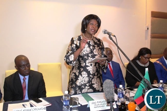 COMERCE Minister, Margaret Mwanakatwe, speaking during the first Eastern Province Symposium on development held at Protea Hotel in Chipata on Thursday. On her right is Luapula Province Minister, Nixon Chilangwa and on her left are Eastern Province Minister, Makebi Zulu and Agicultural Minister, Dora Siliya. PICTURE BY STEPHEN MUKOBEKO/ZANIS