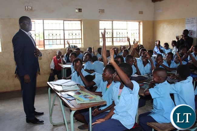 EASTERN Province Minister, Makebi Zulu, interacts with pupils at Kampini Primary School at Chanida border post in Chadiza district on Tuesday. The Minister was on his familiarization tour of the district. PICTURE BY STEPHEN MUKOBEKO/ZANIS EASTERN Province Minister, Makebi Zulu, interacts with pupils at Kampini Primary School at Chanida border post in Chadiza district on Tuesday. The Minister was on his familiarization tour of the district. PICTURE BY STEPHEN MUKOBEKO/ZANIS