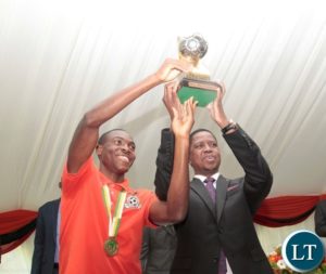President Edgar Lungu and Zambia Under 20 captain Enock Mwapu hoist the African Cup of Nation in Victory of the 2017 championship at State House yesterday 15-03-2017. Picture by ROYD SIBAJENE/ZANIS