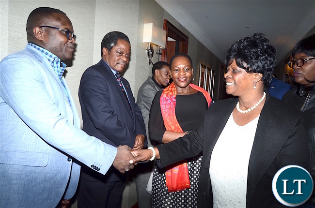 First Lady Esther Lungu greets Zambia UN Mission Military Adviser Brigadier General Erick Mwewa on arrival at Lotte New York Palace Hotel for the sixty-first session of the Commission on the Status of Women in New York on Saturday, March 11,2017. Photo | Thomas Nsama | State House First Lady Esther Lungu greets Zambia UN Mission Military Adviser Brigadier General Erick Mwewa on arrival at Lotte New York Palace Hotel for the sixty-first session of the Commission on the Status of Women in New York on Saturday, March 11,2017. Photo | Thomas Nsama | State House