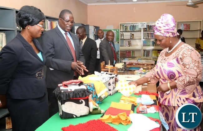 Zambia Institute of Special Education Senior Lecturer Regina Chilufya(l) and head of Department Cassidy Sakala(c) explaining to the First Lady Esther Lungu(r) as the First Lady visited the institution yesterday,3-3-2017, Picture by Ennie Kishiki/Zanis.