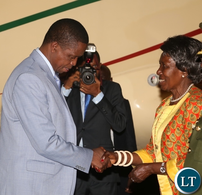 President Edgar Lungu(l) being welcomed by the Vice President Inonge Wina(r) as he arrived from Israel last night around 19:04.Picture by Ennie Kishiki/Zanis.