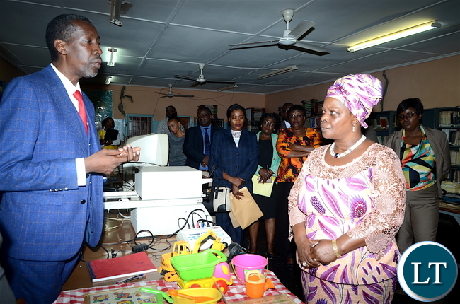 First Lady Esther Lungu with ZAMISE Head of Department for Visual Impairment Muyambango Imasiku Mufanana at Zambia Institute of Special Education where she flagged off the International Women's Day activities under the theme: Promoting inclusiveness in economic participation as a means of attending sustainable development on Friday, March 3,2017 -Pictures by THOMAS NSAMA