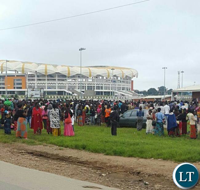 Huge crowds gather outside the OYDC for free food
