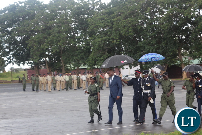 Copperbelt Minister, Bowman Lusambo unveiling medals given to deserving Police Officers during 'Police Day' at Kamfinsa School of Meintenance in Kitwe