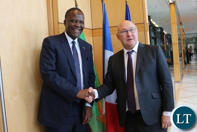 Finance Minister Felix Mutati (L)