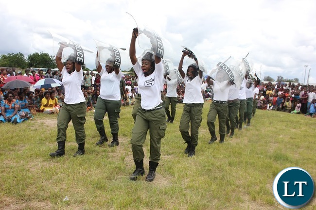 IN RIOT GEAR: Police women in Serenje district demonstrate how Police quail riots. This was during the commemoration of the International women’s day in Serenje district held at the national square.