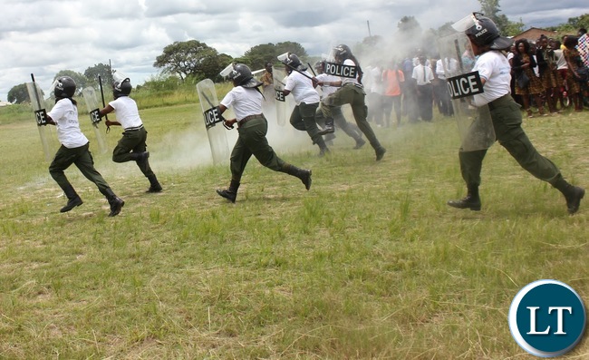 IN RIOT GEAR: Police women in Serenje district demonstrate how Police quail riots. This was during the commemoration of the International women’s day in Serenje district held at the national square.
