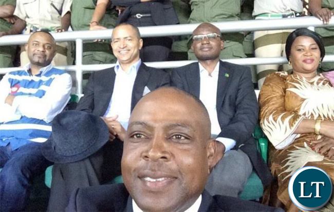 Katumbi Former Katanga Governor Moise Katumbi seated next to State House Spokesman Amos Chanda at Heroes Stadium