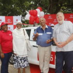 (L-R) KIA representative Mrs Abbygail Richards stands alongside Mr and Mrs Kibrom and Vodafone CEO, Lars Stork.