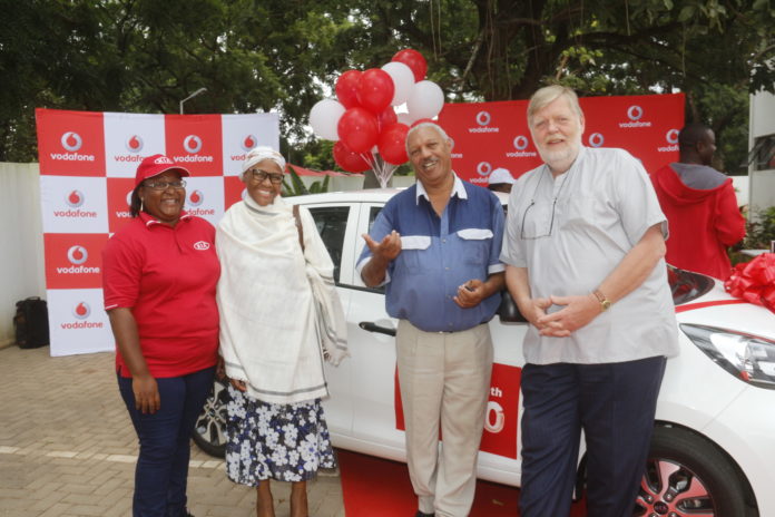 (L-R) KIA representative Mrs Abbygail Richards stands alongside Mr and Mrs Kibrom and Vodafone CEO, Lars Stork.