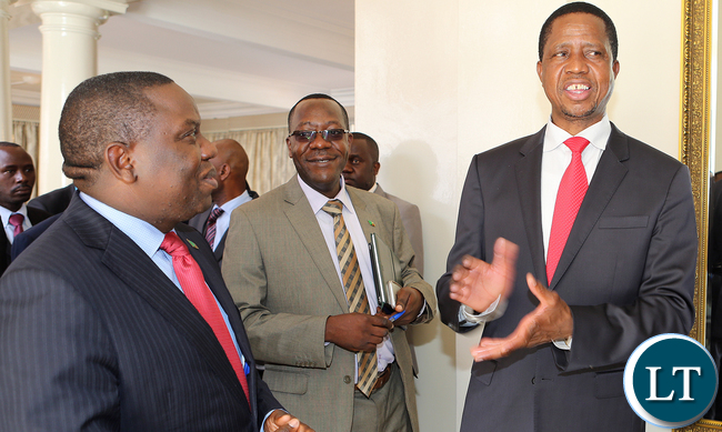 Kaizer Zulu (c) with President Lungu and Harry Kalaba at Statehouse