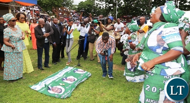 First Lady Esther Lungu (left), PF deputy party secretary general Mumbi Phiri and Minister in the office of the President Freedom Sikazwe join the PF women choir in dancing during this year's international women's day celebrations in Lusaka's show grounds.Picture by SUNDAY BWALYA/ZANIS
