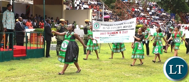 President Edgar Lungu (far left) watching marchers during this year's international women's day commemorations held in the show grounds in Lusaka. Picture by SUNDAY BWALYA/ ZANIS