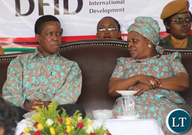 President Edgar Lungu chatting with first lady Esther Lungu during this year's international women's day celebrations in the show grounds in Lusaka. Picture by SUNDAY BWALYA/ ZANIS