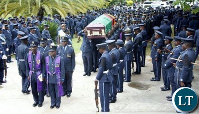 ZAF officers at the Cathedral of the Holy Cross carrying the casket of their deceased colleague