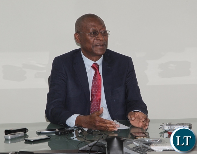 Mopani Copper Mine Board Chairman Moses Chilangwa(l) speaking to Journalists about the ongoing Developmental Programs at Mopani Copper Mine during a Media Briefing in Lusaka yesterday,30-03-2017. Picture by Ennie Kishiki/Zanis.