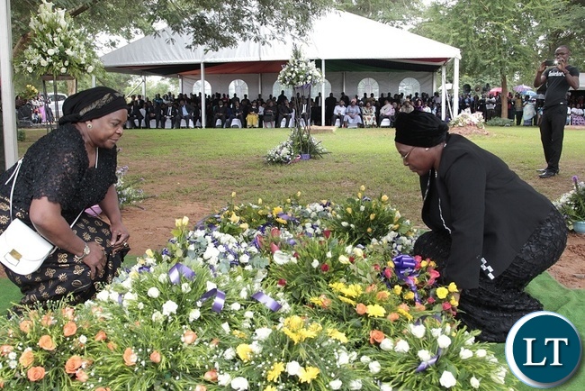 FORMER, First Lady, Maureen Mwanawasa(left) and Christine Sata laying wreaths at Late Regina Chiluba's grave in Lusaka