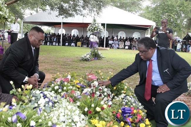 FORMER Press Aide, Richard Sakala(right) and Zambian High Commissioner to South Africa,Emmanuel Mwamba laying the wreath at Late Regina Chifunda Chiluba's grave in Lusaka