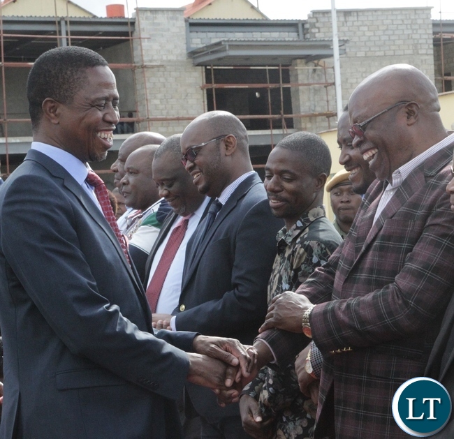President Edgar Lungu(l) chats with Patriotic Front Media Director Sunday Chanda(r) at City Airport in Lusaka yesterday before departure for Mongu to attend the Kuomboka Ceremony ,7-04-2017. Picture by Ennie Kishiki/Zanis.