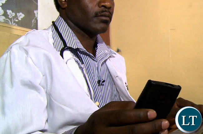 Medical staff on a Mobile Phone