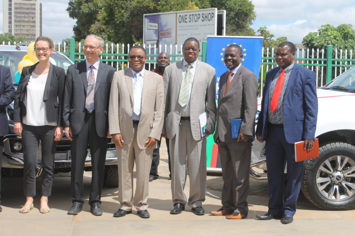 EU delegates, Mines PS Paul Chanda, Mines Director Mooya Lumamba, and far end GSD Director Chipilauka Mukofu EU delegates, Mines PS Paul Chanda, Mines Director Mooya Lumamba, and far end GSD Director Chipilauka Mukofu