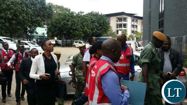 ZICTA officers storming the CEC Liquid Telecom Headquarters