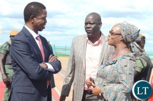 President Edgar Lungu (L) with PF deputy Secretary General Mumbi Phiri as Party Secretary General Davies Mwila (C) looks on at Kenneth Kaunda International Airport shortly before departure for Livingstone on Thursday, April 20,2017-Picture by THOMAS NSAMA