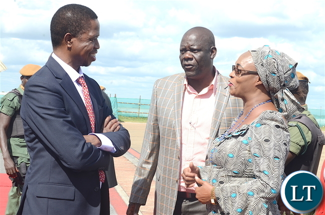 President Edgar Lungu (L) with PF deputy Secretary General Mumbi Phiri as Party Secretary General Davies Mwila (C) looks on at Kenneth Kaunda International Airport shortly before departure for Livingstone on Thursday, April 20,2017-Picture by THOMAS NSAMA
