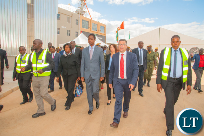 President Edgar Chagwa Lungu inspects Zambian Breweries' new US$33 million malting plant Minister of Commerce, Trade and Industry Hon. Margaret Mwanakatwe, guided by Zambian Breweries Operations Director Franz Schepping.
