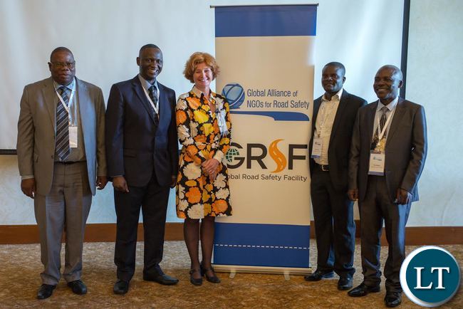 Photo from the Global Meeting of Nongovernmental Organizations Advocating for Road Safety and Road Victims convened in Kuala Lumpur, Malaysia. From left to Right – Edward Phiri (ZRST Secretary), Daniel Mwamba (ZRST Chairman), Lotte Brondum (Executive Director), Miles Mwale and Paul Mwanza (ZRST members). Photo taken by richardahlstrom.com.