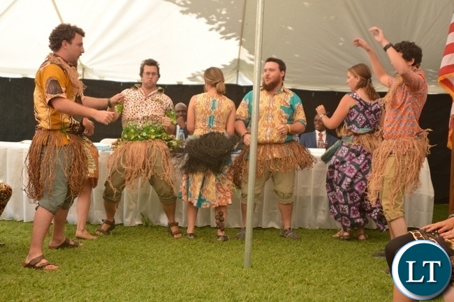 Peace Corp Volunteers performing a Luvale song during the Peace Corps Swearing in Ceremony for Environment and Aqua-Culture Volunteers in Lusaka