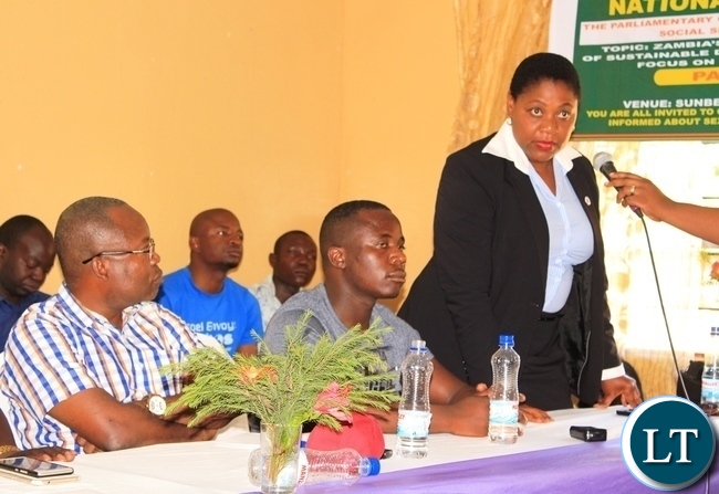 Keembe Member of Parliament, HIV/AIDS activist and member of the Parliamentary Committee on Health, Community Development and Social Services, Princess Kasune, talks to Masaiti residents during a public hearing held by the committee in the district