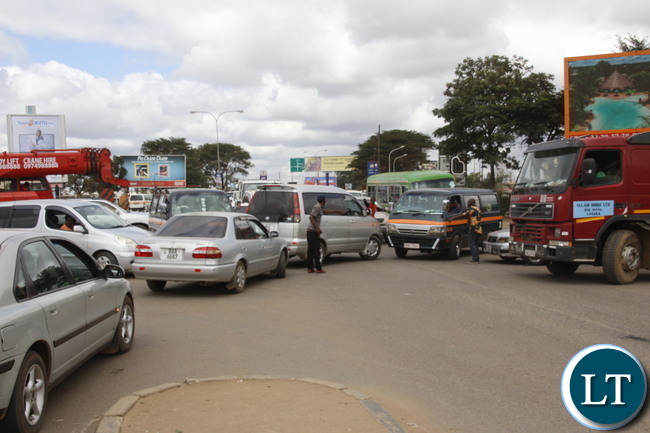 Lusaka Traffic Jam at the Kafue Junction: A motorist trying to control the traffic at Kamwala Kafue road junction around midday. Picture by Jean Mandela