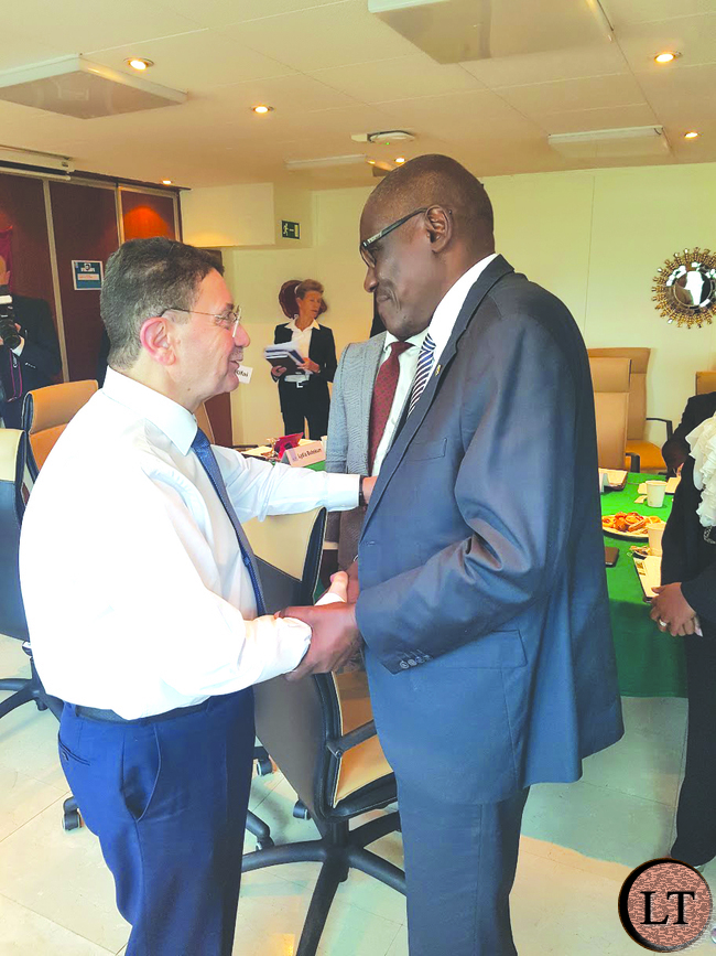 ourism and Arts Minister Charles Banda (right) talking to UNWTO Secretary General when the two met.