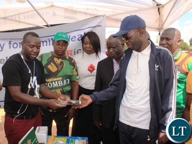 Copperbelt Province Permanent Secretary, Elias Kamanga, visits some stands after he launched the National Health Week at Wusakile Ground in Kitwe