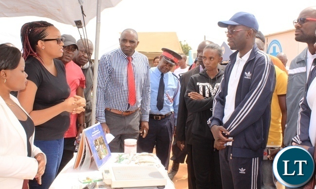 Copperbelt Province Permanent Secretary, Elias Kamanga, visits some stands after he launched the National Health Week at Wusakile Ground in Kitwe