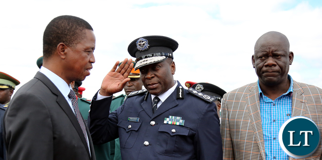 President Edgar Lungu greets the IG Mr Kanagnja at KK international airport in Lusaka