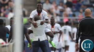 Fashion Sakala celebrates the second goal with the bench