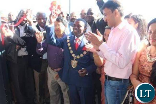Luanshya Mayor Nathan Chanda cutting the ribbon during the opening of Roan Mall