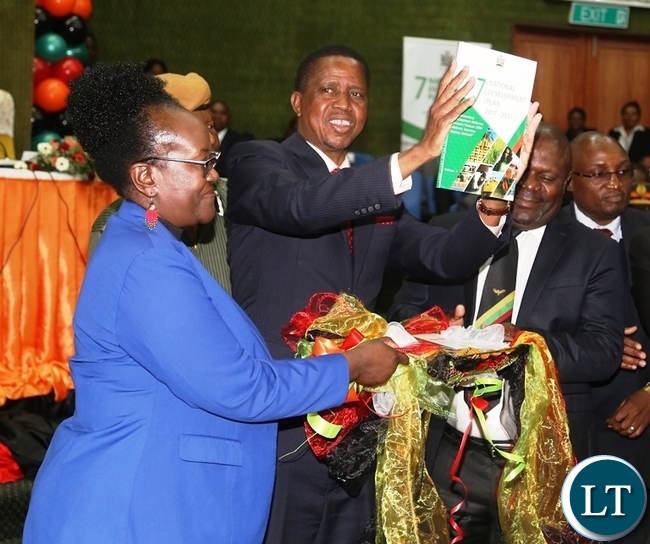 President Edgar Lungu (second from left) cuts the ribbon to officially launch the seventh National Development Plan 2017 to 2021 at Mulungushi Conference Centre.On the middle is National Planning Minister Lucky Mulusa. Picture by SUNDAY BWALYA / ZANIS