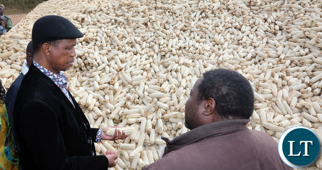 President Edgar Lungu chats with Mr Joseph Daka Maize Seed farmer of Mkushi farming Block during the Tours of Mkushi farms4076