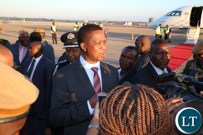 President Edgar Lungu speaking to journalists shortly after his arrival from Lesotho at Kenneth Kaunda International Airport