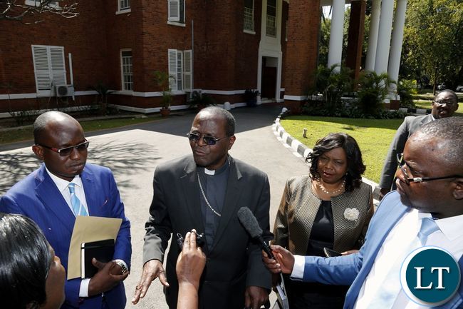 Archbishop Telesphore Mpundu (second from left) Minister of National Guidance and Religious Affairs Rev. Godfridah Sumaili (second from right) and Special Assistant for Press and Public Relations Amos Chanda (left) addresses the media after a meeting with President Edgar Chagwa Lungu at State House on Tuesday,July 25,2017 .PICTURE BY SALIM HENRY/STATE HOUSE ©2017